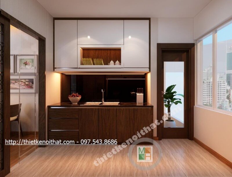 Hệ thống tủ bếp gỗ công nghiệp được thiết kế đơn giản, kết hợp 2 tone màu nâu trầm và trắng tạo hiệu ứng màu sắc mang đến cảm giác thư giãn và thanh thoát nhẹ nhàng. Tủ bếp đẹp, sang trọng và đẳng cấp